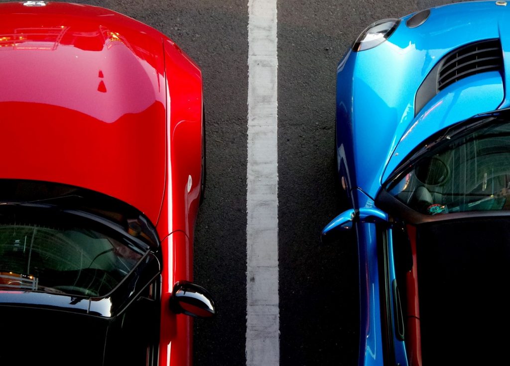 Two cars parked side by side